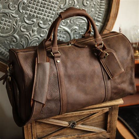 sac voyage cuir homme hermes|The official Hermes online store .